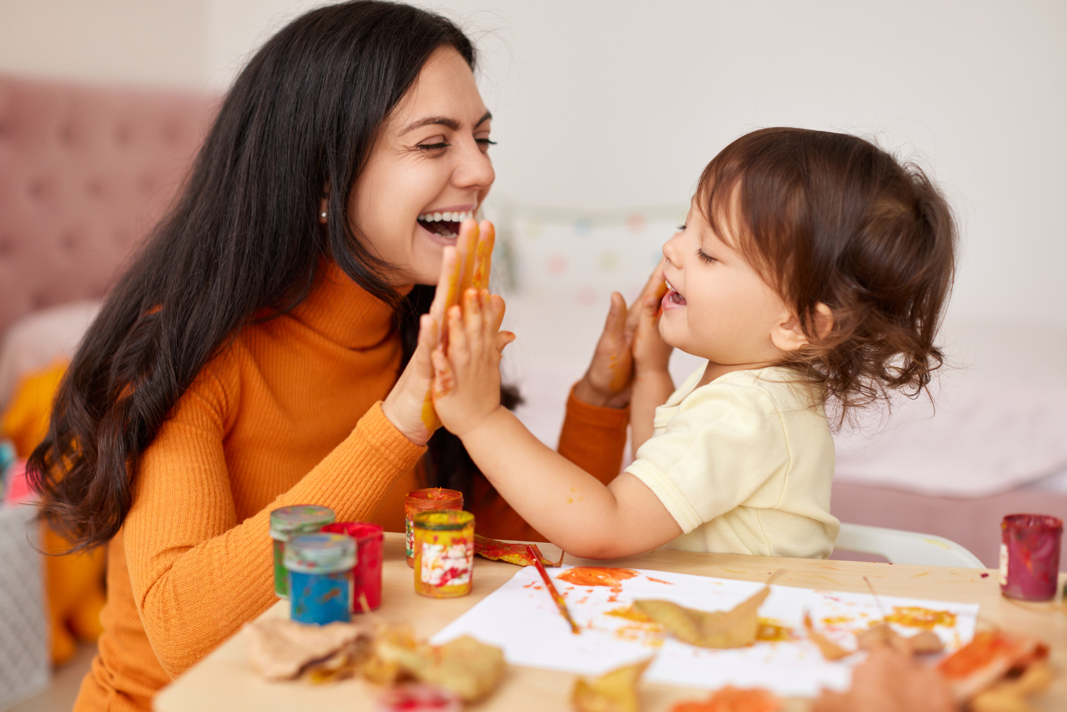 Psychologist engaging a young child in a play-based activity