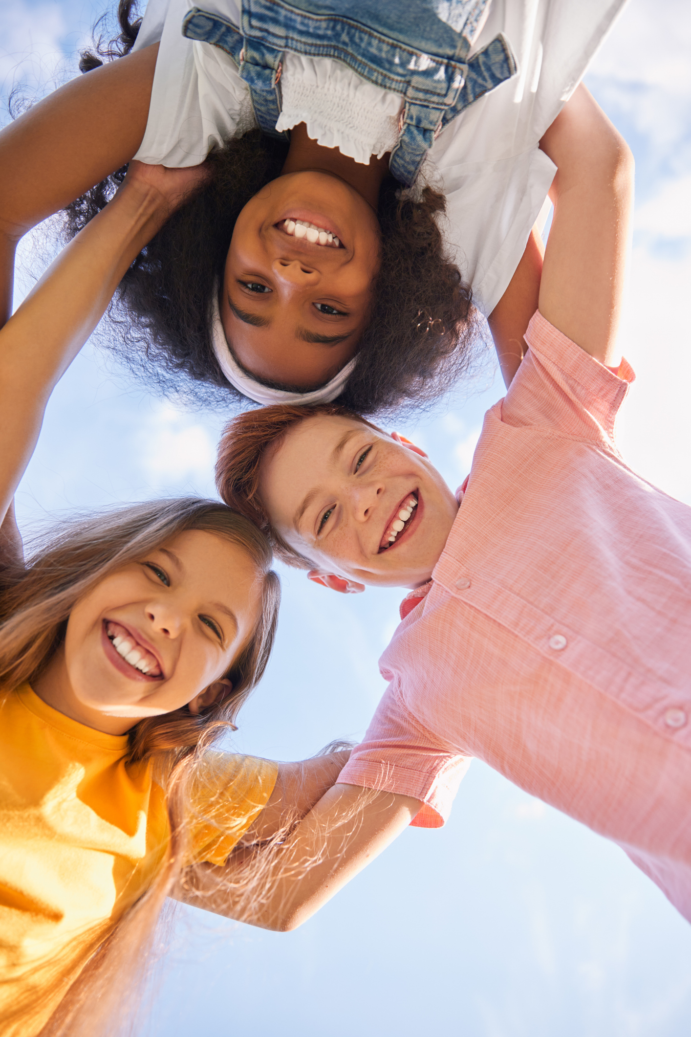 Children laughing together in a social skills group at a Behavioral Innovations center