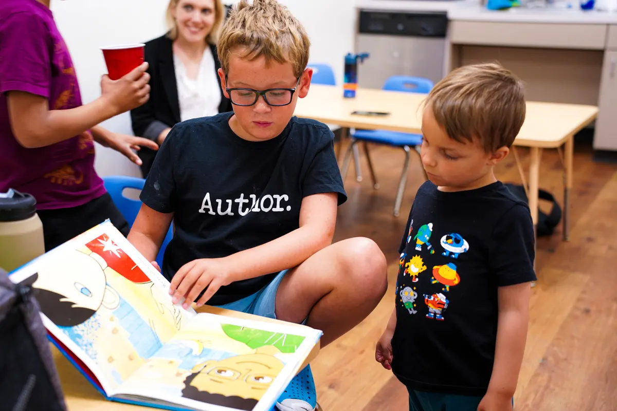 Children reading together during social skills group
