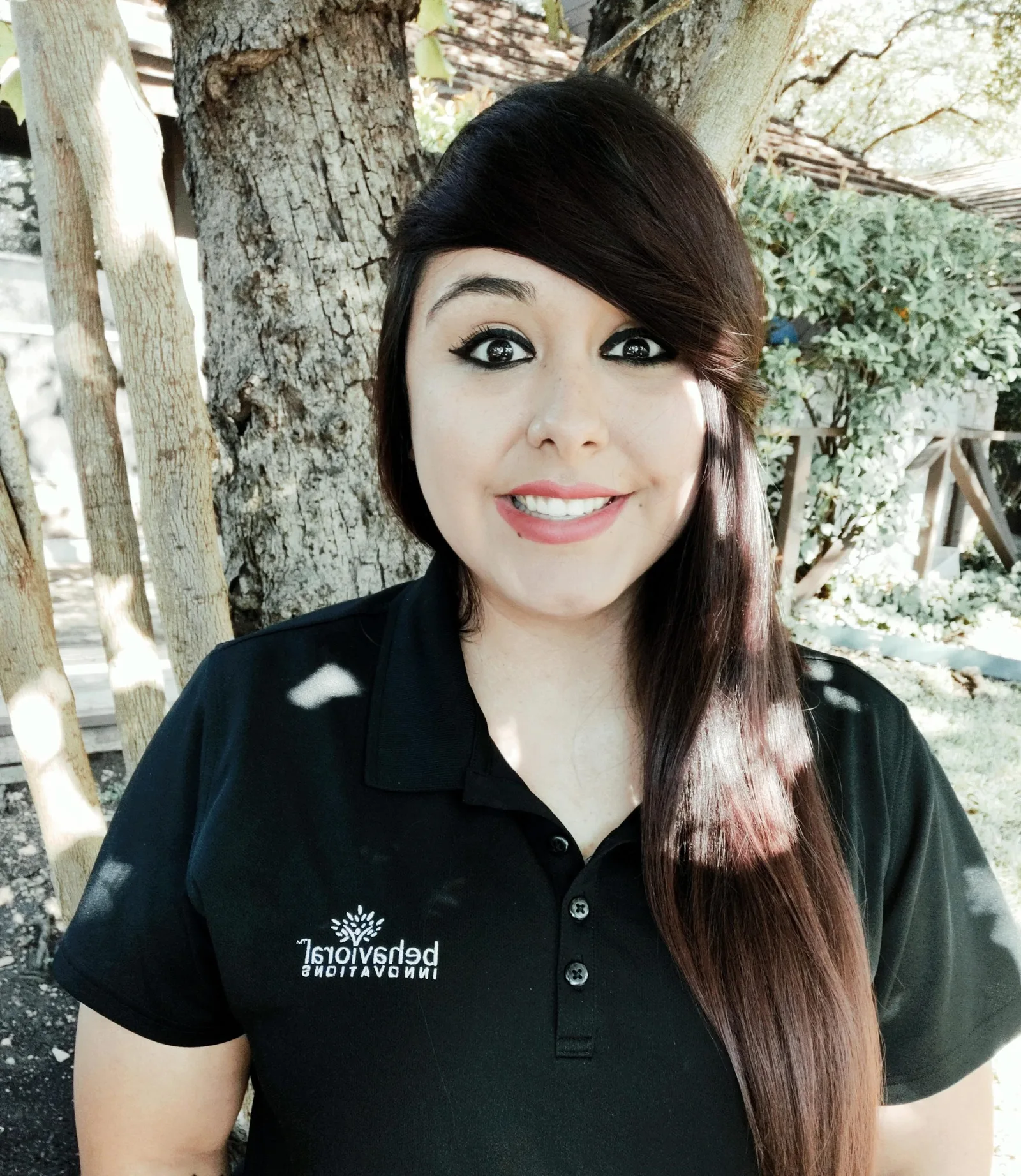 a woman wearing a black shirt that says texas childhood education