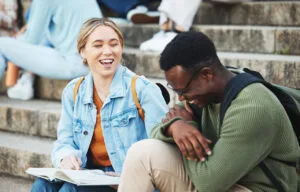 college students chatting on the stairs