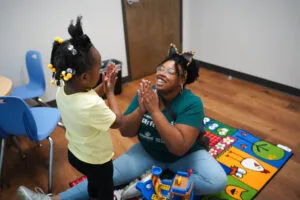 aba therapist playing with a child
