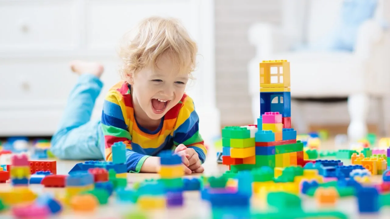 A child plays with blocks.