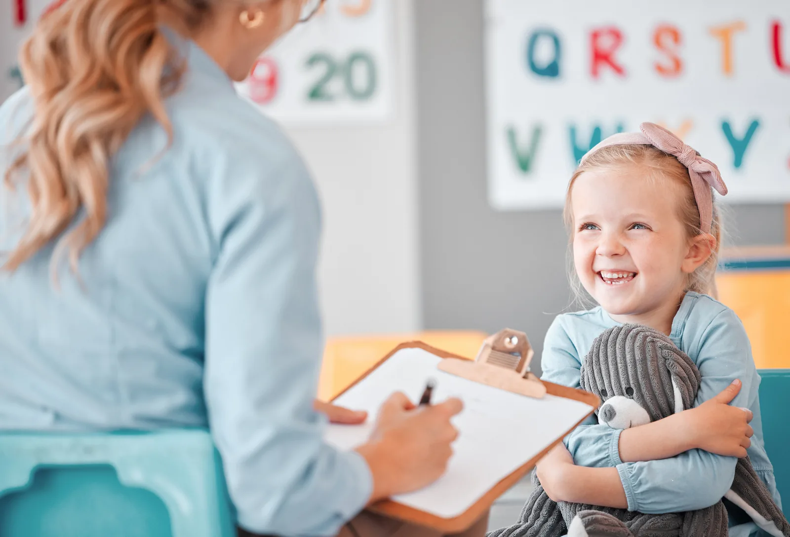 Caregiver and child engaged in supportive dialogue