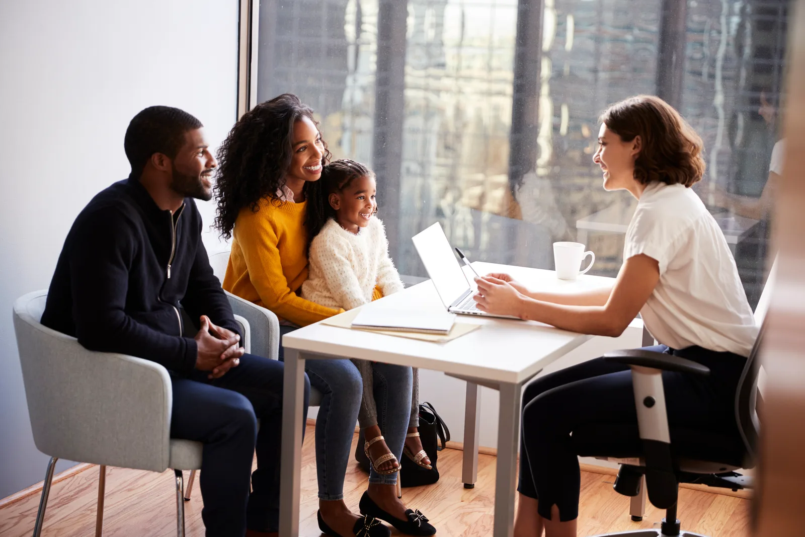 Family meeting with a specialist to discuss their child’s support