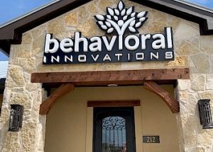 the front of a building with a sign that says behavioral innovations