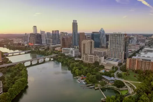 an aerial view of a city with a river running through it