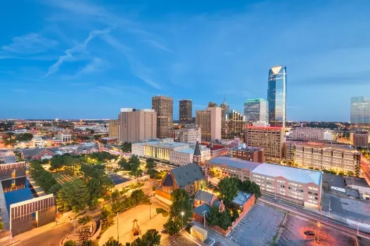 an aerial view of the city of oklahoma at night