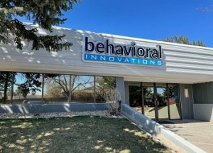 a building with a sign that says behavioral innovations on it