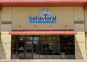 the front of a building with a sign that says behavioral innovations