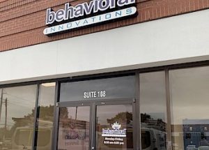 a building with a sign that says behavioral innovations on it
