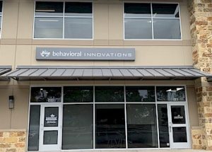 the front of a building with a sign that says behavioral innovations