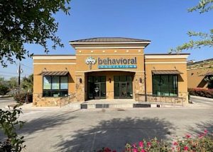 a building with a sign that says behavioral innovations on it