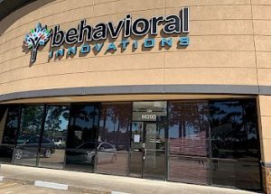 a building with a sign that says behavioral innovations on it
