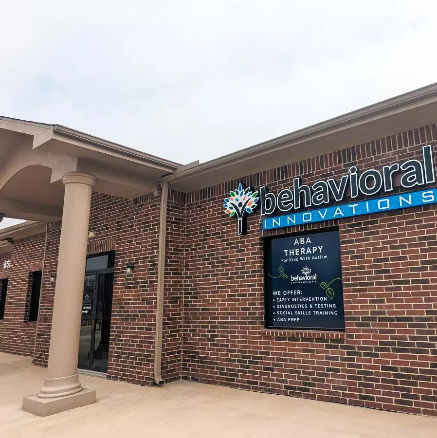 a brick building with a sign that says behavioral innovations