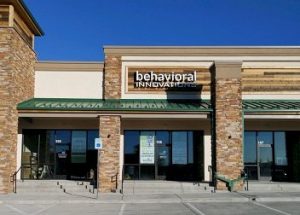 a building with a sign that says behavioral innovations on it
