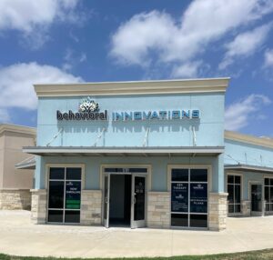 a building with a sign that says behavioral innovations