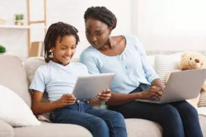 mother teaching child at home