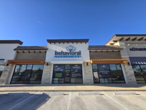 a behavioral innovations building with a sign that says aba therapy